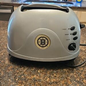 Silver Toaster with Control Buttons